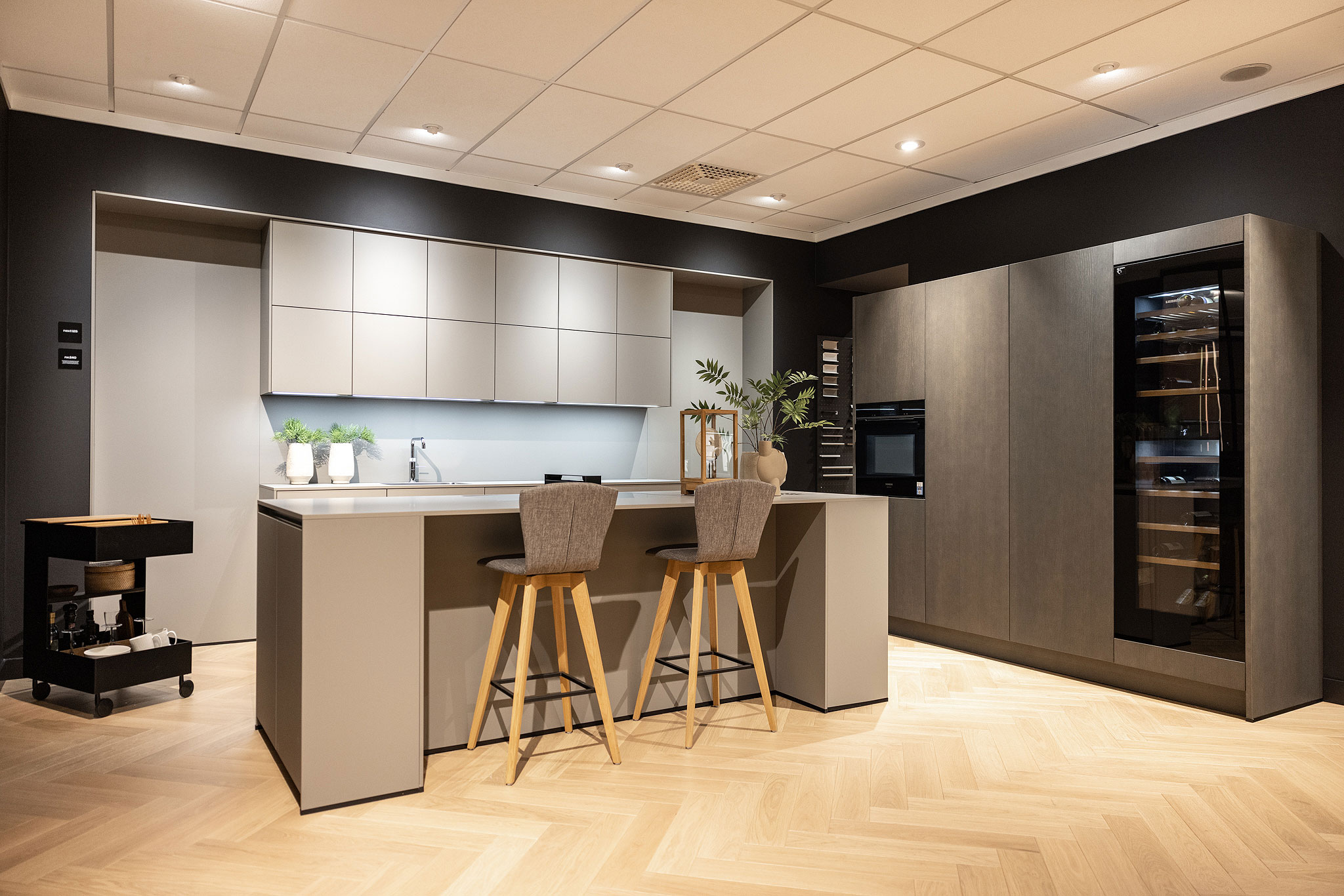 Het kookeiland met gecombineerde bar zorgt ervoor dat het koken gezelliger wordt.