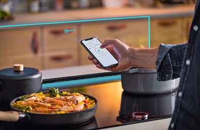 De kristalheldere Glass Downdraft afzuigkap.