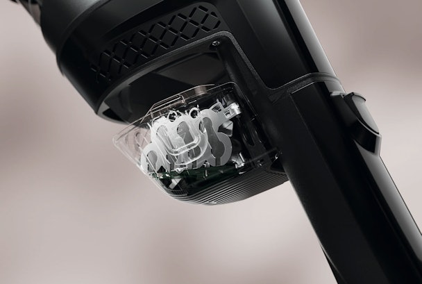 Close-up van verwisselbare 25,2V Li-ion accu in de Miele Triflex HX3 PowerUnit