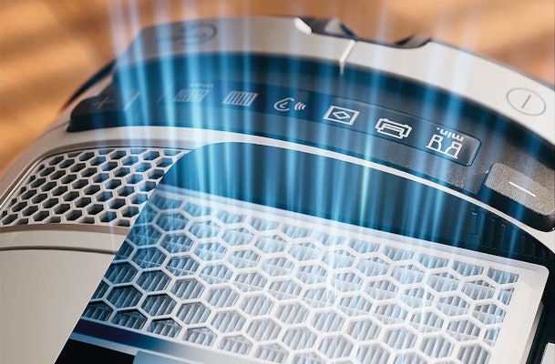 Anti-allergie stofzuiger doorsnede toont HEPA-filter en cycloon technologie voor allergeenvrije luchtstroom en stofscheiding