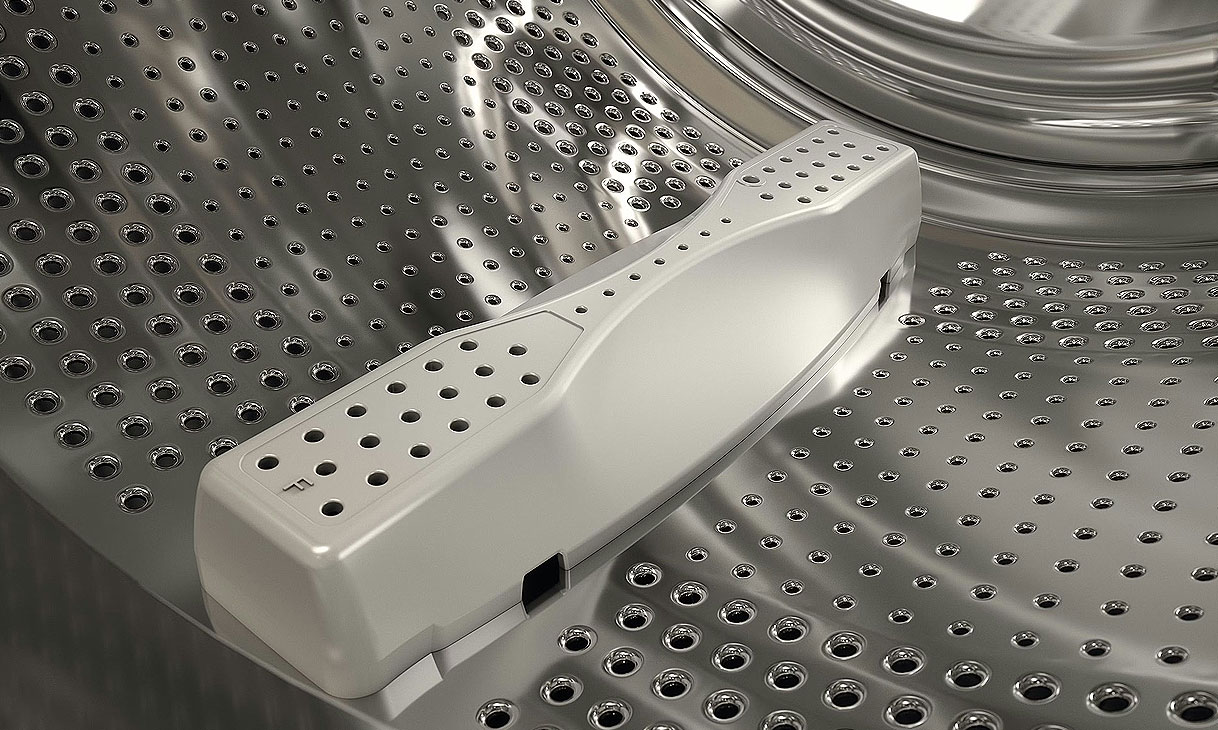 Zandlopervormige meenemers geleiden wasgoed naar het zachte midden en voeren vuil af via de rand