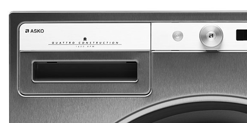 Frontpaneel van een ASKO wasmachine met bedieningsknop en display