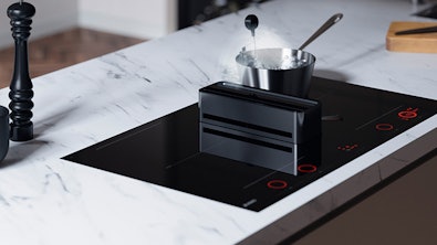 Elevate inductiekookplaat met geïntegreerde afzuiging