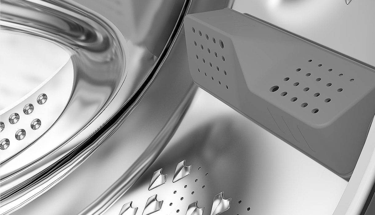 Close-up van Beko AquaWave trommel met speciale alveolen en schoepen voor zachte kledingbehandeling