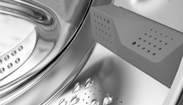 Close-up van Beko AquaWave trommel met speciale alveolen en schoepen voor zachte kledingbehandeling