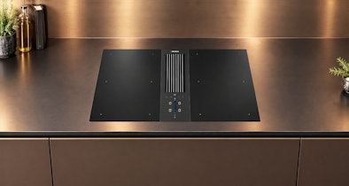 BORA Classic 2.0 modulaire kookplaat met afzuiging en kookvelden op donker werkblad