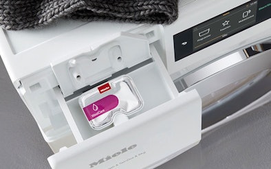 Miele wasmachine met CapDosing systeem en WoolCare capsule voor optimale verzorging van delicate stoffen zoals wol en zijde