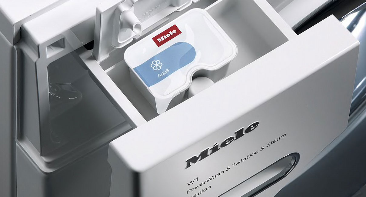 Miele CapDosing systeem met wasmiddelcapsule voor automatische dosering bij speciale textielsoorten