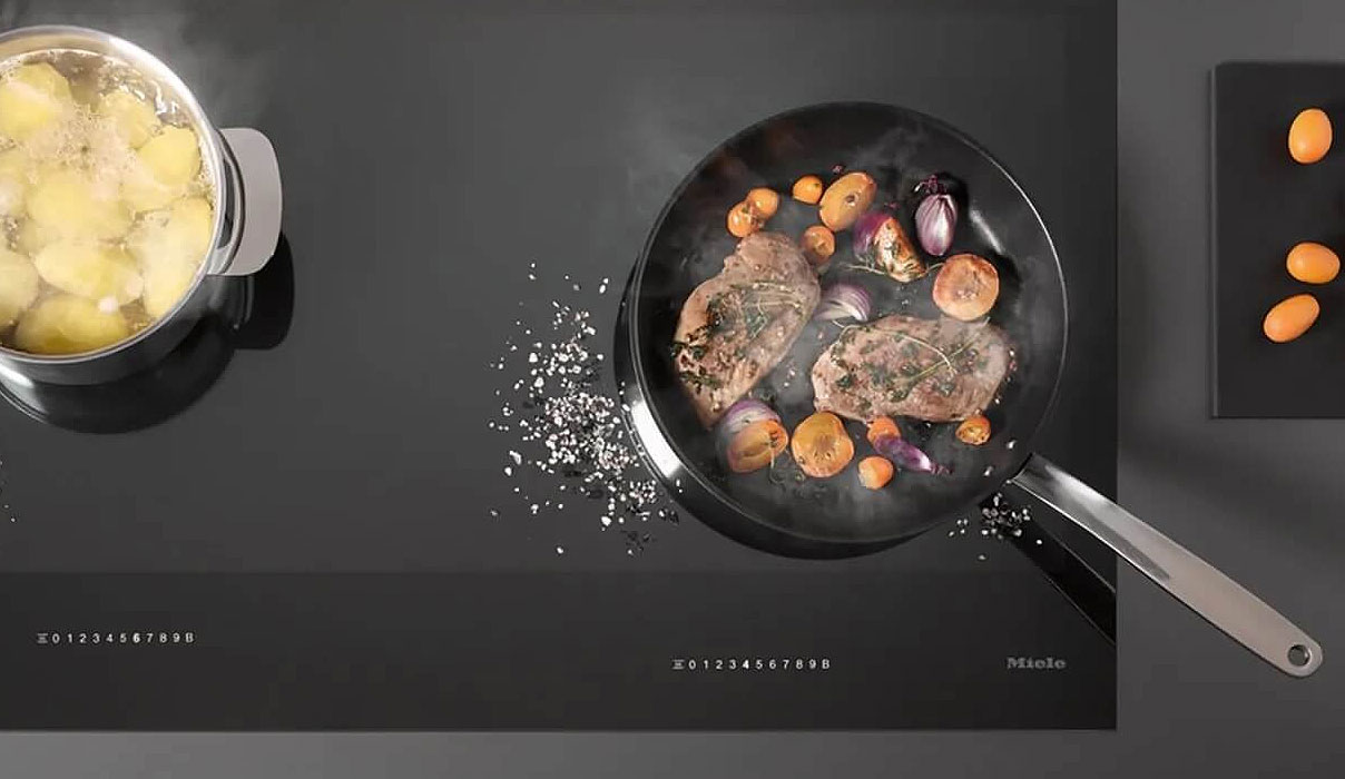 Miele DirectControl Plus inductiekookplaat verlichte cijfers intuïtieve bediening touchscreen