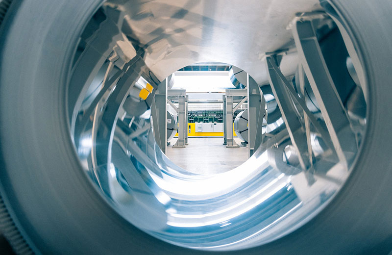 Productie van V-ZUG met energie-efficiënte technologie en duurzame materialen die zorgen voor lager energieverbruik en uitstekende energielabels.