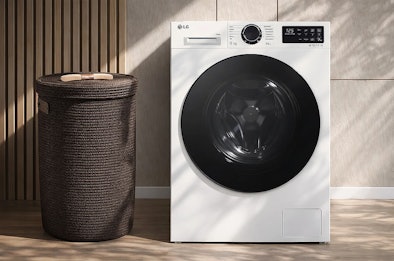 LG wasmachine met energielabel A en Inverter Direct Drive motor naast een donkere wasmand