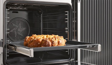 Miele oven FlexiClip geleiders telescopische uitschuifsysteem veilig bedienen bakplaten zonder brandgevaar