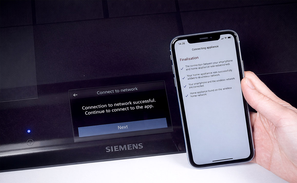 Siemens HomeConnect app op smartphone voor het bedienen van een kookplaat met afzuiging op afstand