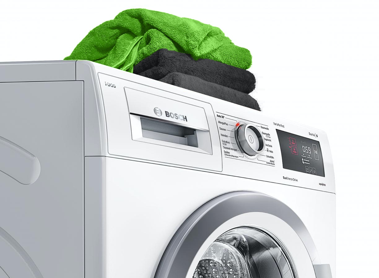 Handdoeken op een iDOS wasmachine van Bosch.
