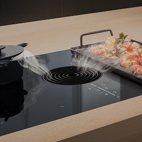 In kookplaat geïntegreerde afzuiging.