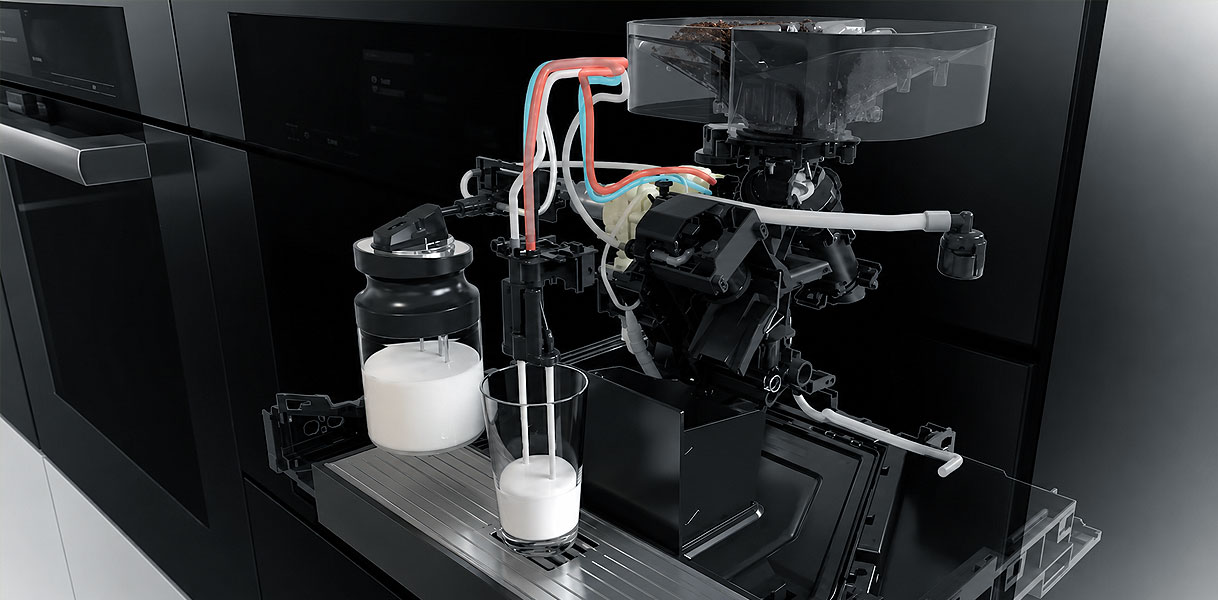 Doorsnede van een inbouw koffiemachine met melksysteem dat melk opschuimt in een glas