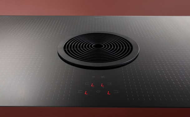 Deze inductiekookplaat met afzuiging beschikt over kinderbeveiliging