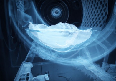 Wasmachine trommel met lichteffecten die de iSensoric sensortechnologie visualiseren