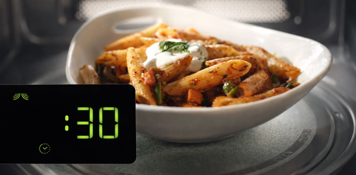 Whirlpool JetStart functie met 30 seconden timer en pasta gerecht klaar voor direct opwarmen