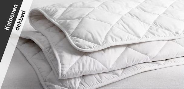 Wit katoenen dekbed met diagonaal doorgestikt patroon