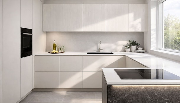 Lichte moderne keuken met witte fronten en dun werkblad, kleine keuken oogt ruimtelijk door minimalistisch design