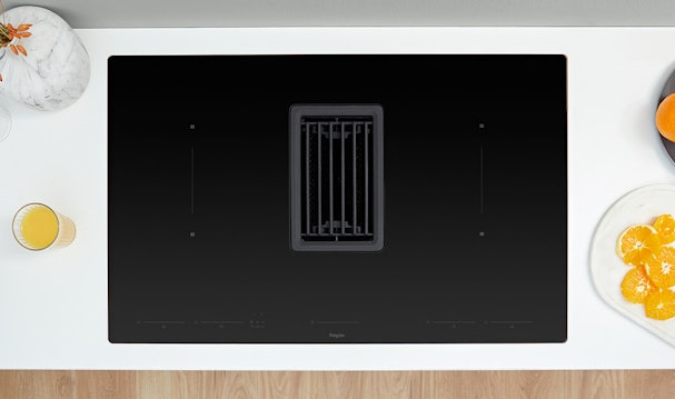 Koken op een Pelgrim inductie met afzuiging.