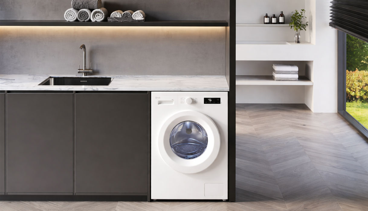 LG wasmachine met 8 kg vulgewicht ingebouwd in moderne grijze keuken met geopende trommel