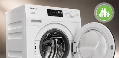 Miele wasmachine van 10 kg met 1400 toeren en geopende deur voor een groot huishouden