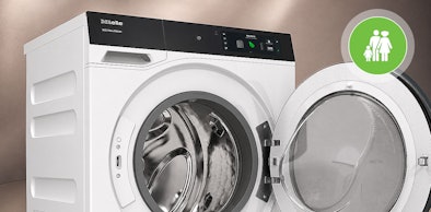 Miele wasmachine van 9 kg met 1400 toeren en geopende deur voor een gezin