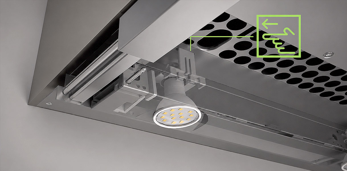 Led-spot aan de onderkant van een Miele afzuigkap met draairichting voor het loshalen