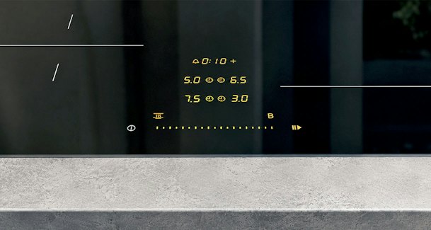Bedieningspaneel van inductiekookplaat met standen per zone, timer en aanduiding voor booster