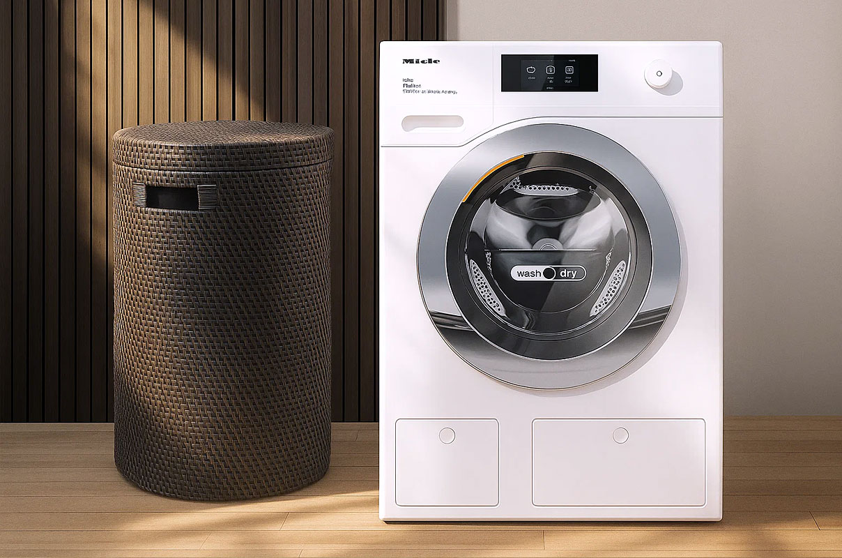 Miele was-droogcombinatie met modern design naast wasmand, ideaal voor ruimtebesparing en efficiënt wassen en drogen