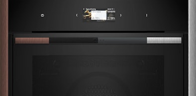 NEFF oven met Flex Design handgreep en zijlijsten in Brushed Bronze en Metallic Silver