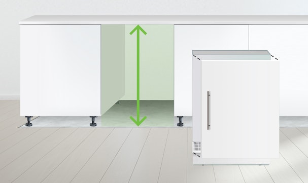 Opmeten van de nishoogte voor een onderbouw koelkast