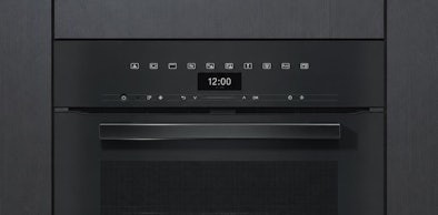 Obsidiaanzwarte Miele inbouw magnetron met zwart glazen front en digitaal bedieningspaneel.