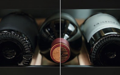 Close-up wijnflessen in Miele wijnklimaatkast met constante luchtvochtigheid voor kurkbescherming