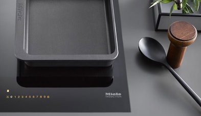 Miele permanente panherkenning inductiekookplaat intelligente sensoren energiebesparing veiligheid