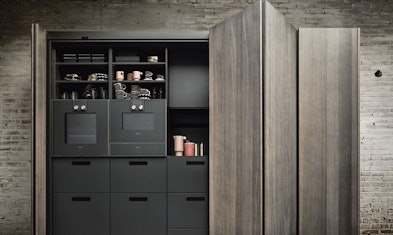 Het next125 pocketsysteem: een multifunctionele kast met schuifdeuren.