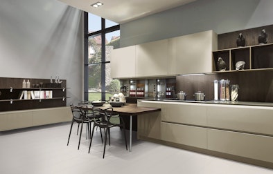 Rechte keuken met geïntegreerde keukentafel.