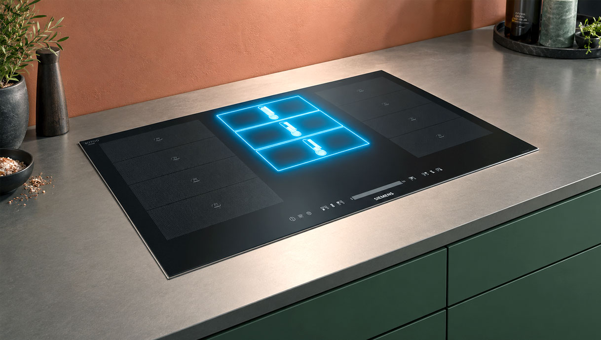 Drie powerMove stroken met vaste temperatuur uitgelicht op een Siemens inductie kookplaat