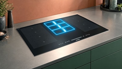 Drie powerMove stroken met vaste temperatuur uitgelicht op een Siemens inductie kookplaat