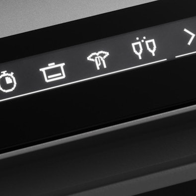Close-up van V-ZUG Adora display met pictogrammen; Silent-programma voor ultra-stille werking in open keukens.