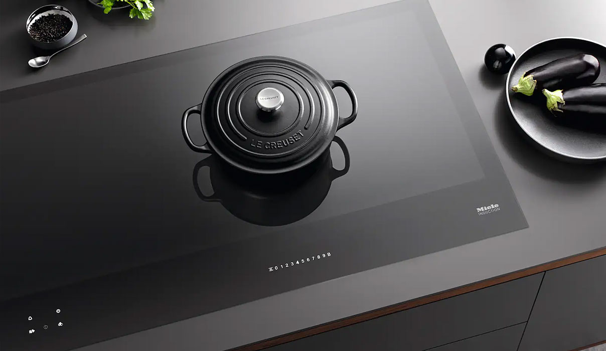 Miele SmartSelect bediening inductiekookplaat verlichte cijfers touch controle intuïtief