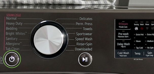 LG wasmachine bedieningspaneel met aan/uit-knop, wasprogramma's en temperatuurinstellingen