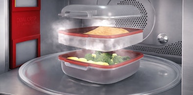Whirlpool steam stoomfunctie met gestoomde groenten in stapelbare stoomcontainers in de magnetron