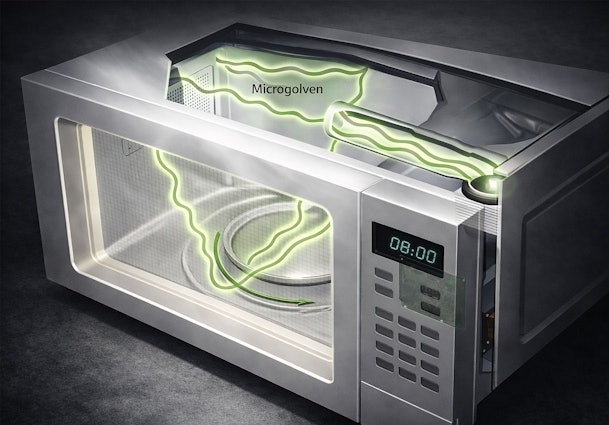 Doorzichtige illustratie van magnetron met groene microgolven die vanuit de antenne door de binnenruimte verspreiden