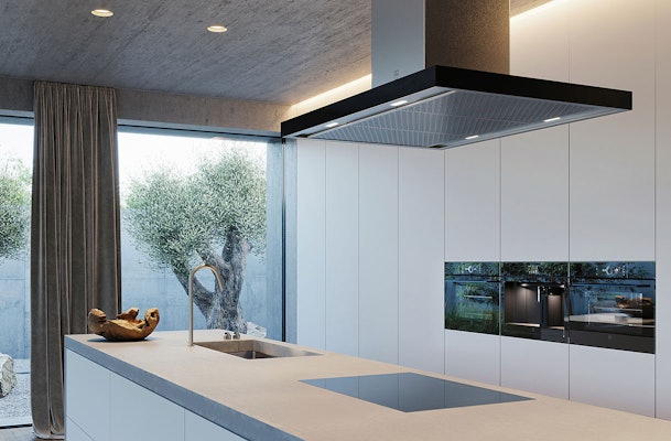 V-ZUG AiroClearIsland V6000 eilandafzuigkap boven kookeiland in moderne keuken, met spiegelglas en roestvrij staal, FlexLED-verlichting en fluisterstil SilentPlus.