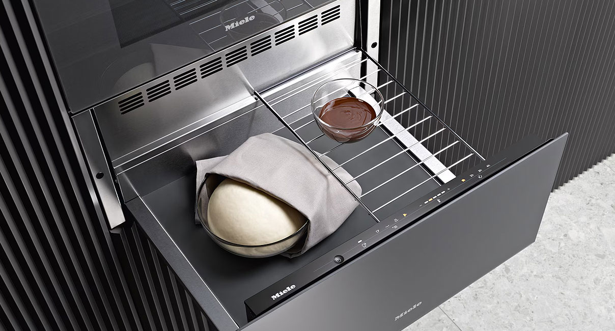 Miele warmhoudlade met diverse gebruiksmogelijkheden zoals deeg laten rijzen en chocolade smelten