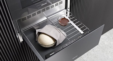 Miele warmhoudlade met diverse gebruiksmogelijkheden zoals deeg laten rijzen en chocolade smelten