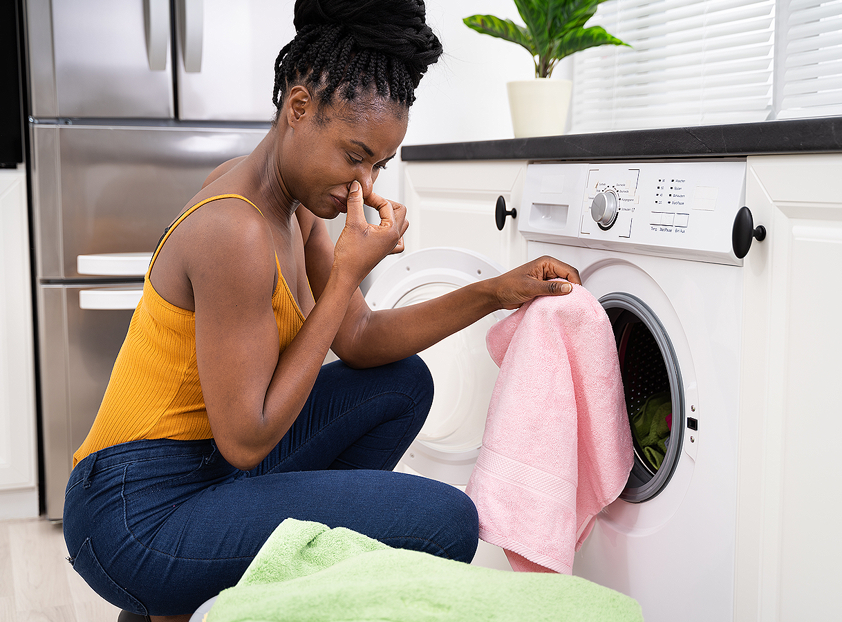 Was ruikt muf door verkeerd gebruik van wasmiddellade in wasmachine